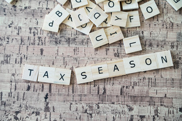 Tax Season Spelled out in Letter Tiles