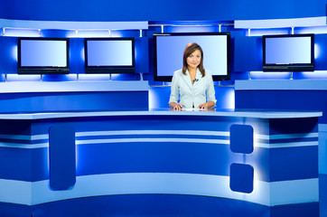 television anchorwoman at TV studio