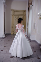 Fototapeta premium Beautiful bride in wedding dress