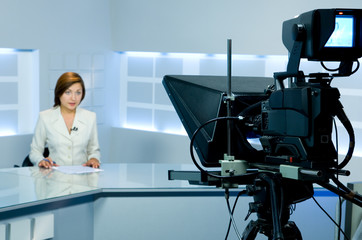 television anchorwoman during live broadcasting - 191450148