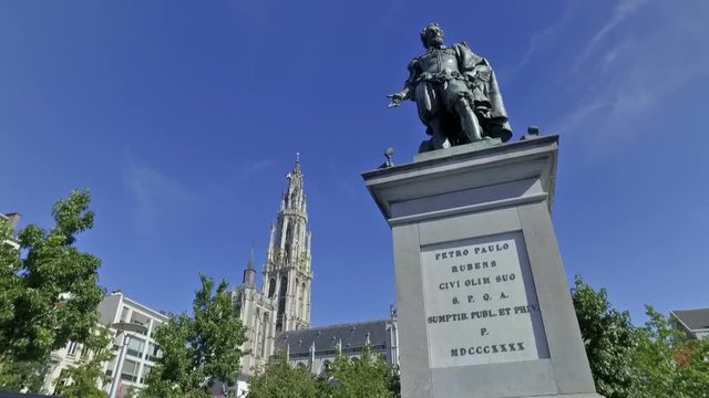 Rubens statue in Antwerp, Belgium in a sunny day. Cathedral of Our Lady in the background.