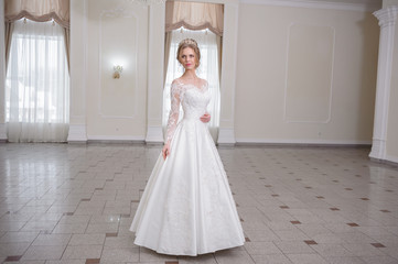 Beautiful bride in white interior