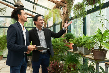 Meeting in greenhouse