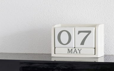 White block calendar present date 7 and month May