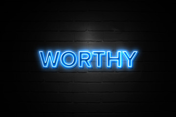 Worthy neon Sign on brickwall