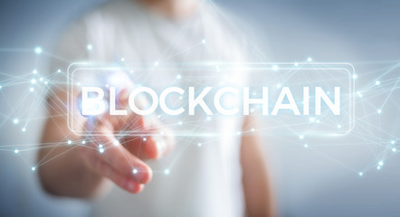 Businessman using blockchain cryptocurrency interface 3D rendering