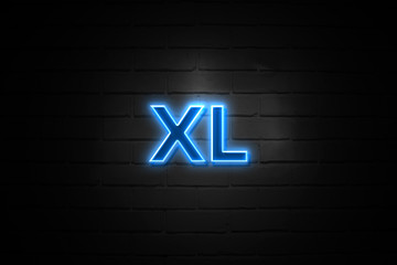 Xl neon Sign on brickwall
