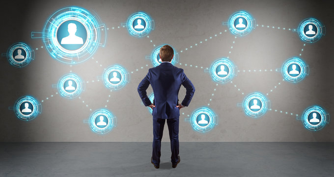 Businessman using social network interface on a wall 3D rendering