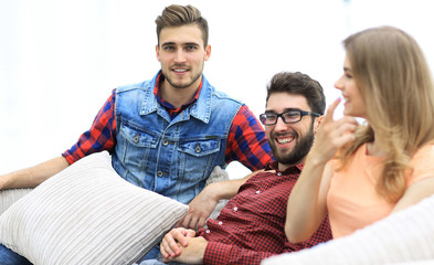 group of young people going on the couch.