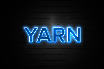 Yarn neon Sign on brickwall