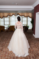 Fototapeta premium Portrait of beautiful bride in wedding dress