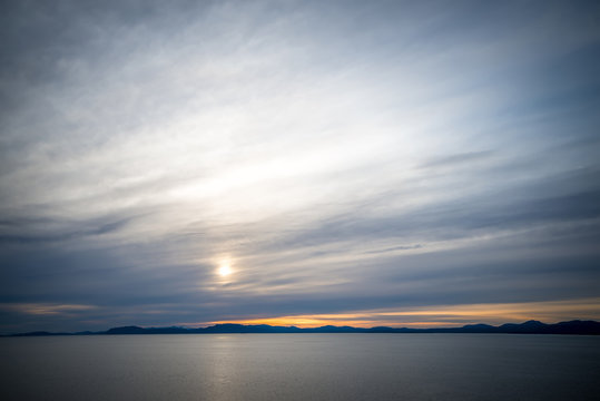 sunset over alaska fjords on a cruise trip near ketchikan