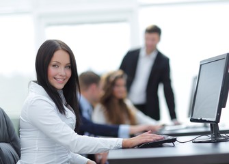 Naklejka premium business woman on the background of the office