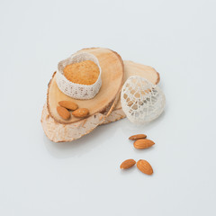 Cake in a casket in the form of heart on a section of wood