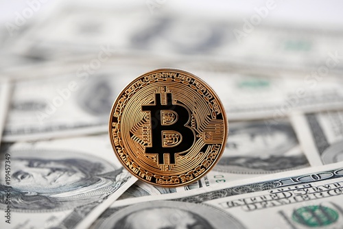 Shiny Golden Bitcoin Lying On Hundred Dollar Bills Presenting Shiny Golden Bitcoin Lying On Hundred Dollar Bills Presenting Gest Cryptocurrency And New Futuristic Form Of