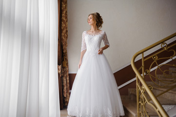 Fototapeta premium Beautiful bride in wedding dress