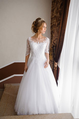 Fototapeta premium Beautiful bride in wedding dress