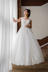 Fototapeta premium Beautiful bride in wedding dress