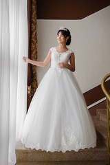 Fototapeta premium Beautiful bride in wedding dress