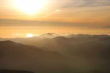 Obraz premium beautiful view of the sun reflected in the sea from ligurian mountains