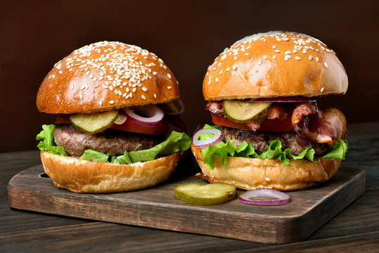 Hamburgers on wooden board