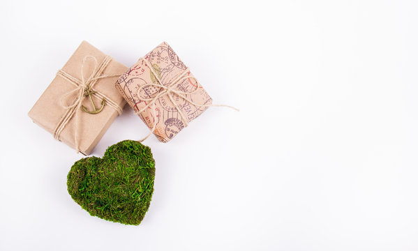 Green heart and gifts. Romantic concept. Natural Valentine card. St. Valentine's Day. Copy space