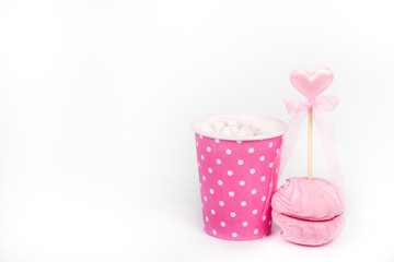 Hot chocolate and airy pink marshmallow. Romantic concept. St. Valentine's Day. Copy space