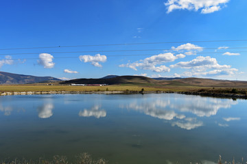 Clouds and sky reflection at the river/ landscape nature photography