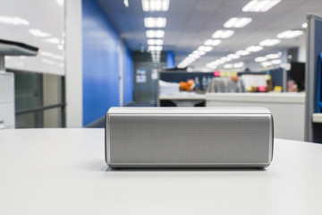 portable wireless loud speaker in office for listening to music