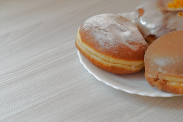 Polish traditional donuts (called pączki) prepared for Fat Thursday - a traditional Christian feast marking the last Thursday before Lent.