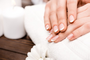 cropped view of woman making medicine in beauty salon, nail care concept