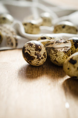 Fresh Organic Quail Eggs on Wooden Table.