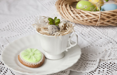 Egg shape cookie and Easter decor. Selective focus, close-up, shallow depth of field. Easter concept