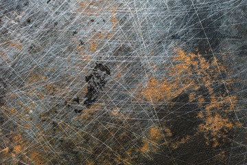 Grunge metal background with scratches and rust