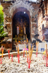 Incense offerings at Thai temple in Chiang Mai, Thailand