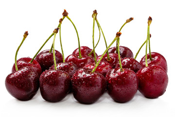 Cherry berries with droplets of water isolated on white background cutout