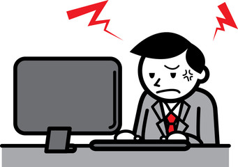 パソコンの前でイライラするサラリーマン