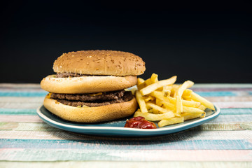 Cheese burger - American cheese burger with Golden French fries