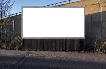 Billboard blank near road pavement for outdoor advertising poster or blank billboard for advertisement