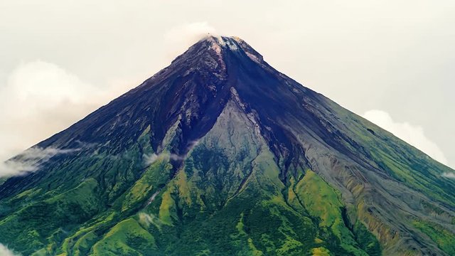 Mayon Volcano in Legazpi, Philippines. Mayon Volcano is an active volcano and rising 2462 meters from the shores of the Gulf of Albay.