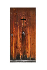 Aged wooden chapel door with carved cross isolated on white background