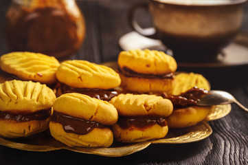 Homemade corn shortbread cookies with caramel sauce.