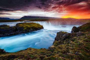 Powerful flow of water Godafoss cascade. Location Skjalfandafljot river, Iceland.