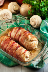 Baked chicken breast stuffed with champignon