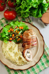 Chicken breast stuffed with champignon