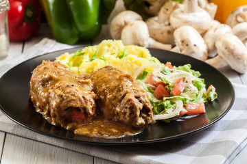 Pork rolls in sauce