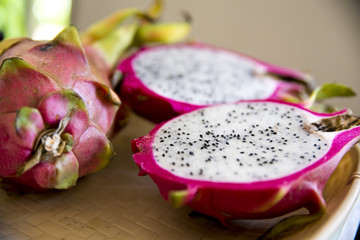 Ripe Dragon Fruits Full and Cut in Half