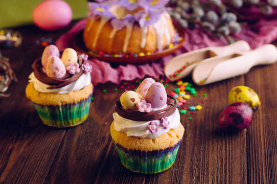 Easter cupcakes decorated with candy eggs in nest