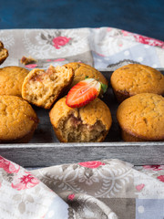Peanut butter muffins with strawberry jam. Home made treat.