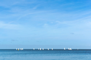 The calm sea. Ships on the horizon. Sea surface.